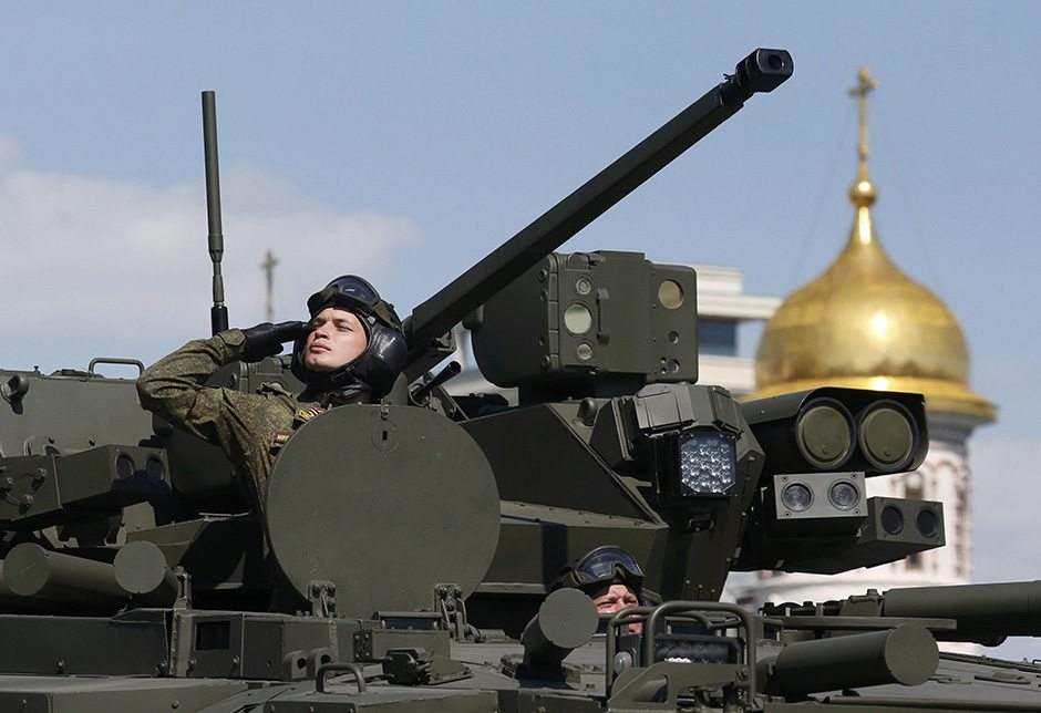 Russian servicemen drive a Kurganets-25 armoured personnel carrier during the Victory Day parade, marking the 71st anniversary of the victory over Nazi Germany in World War Two, at Red Square in Moscow, Russia, May 9, 2016. REUTERS/Grigory Dukor